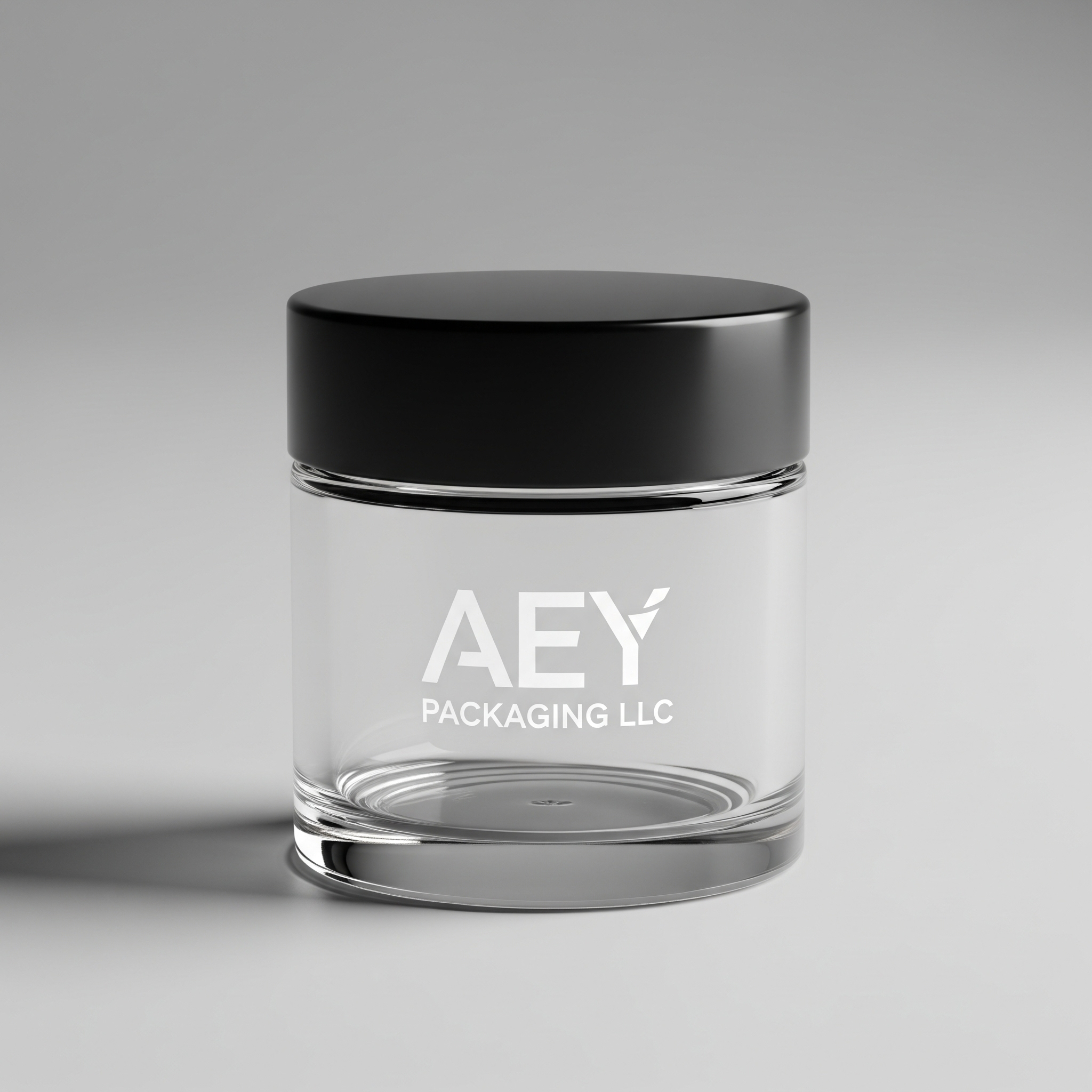 A high-end product photo of a small glass jar with a black lid, featuring the AEY Packaging LLC logo.